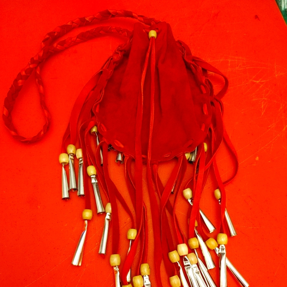 Hand made deer hide jingle purse